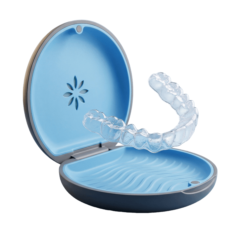Close-up of a clear Invisalign aligner and case