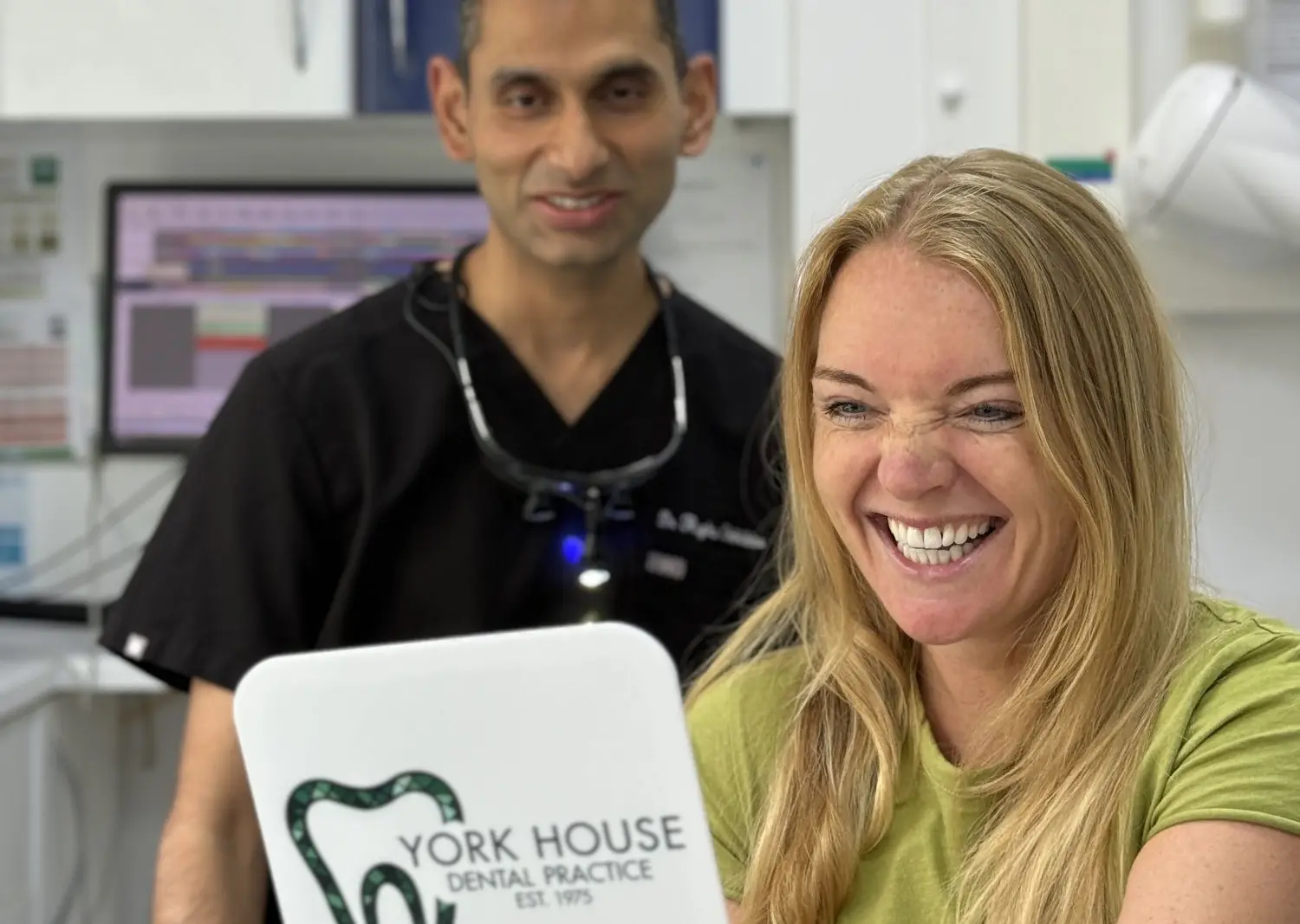 Patient smiling confidently after a smile makeover treatment